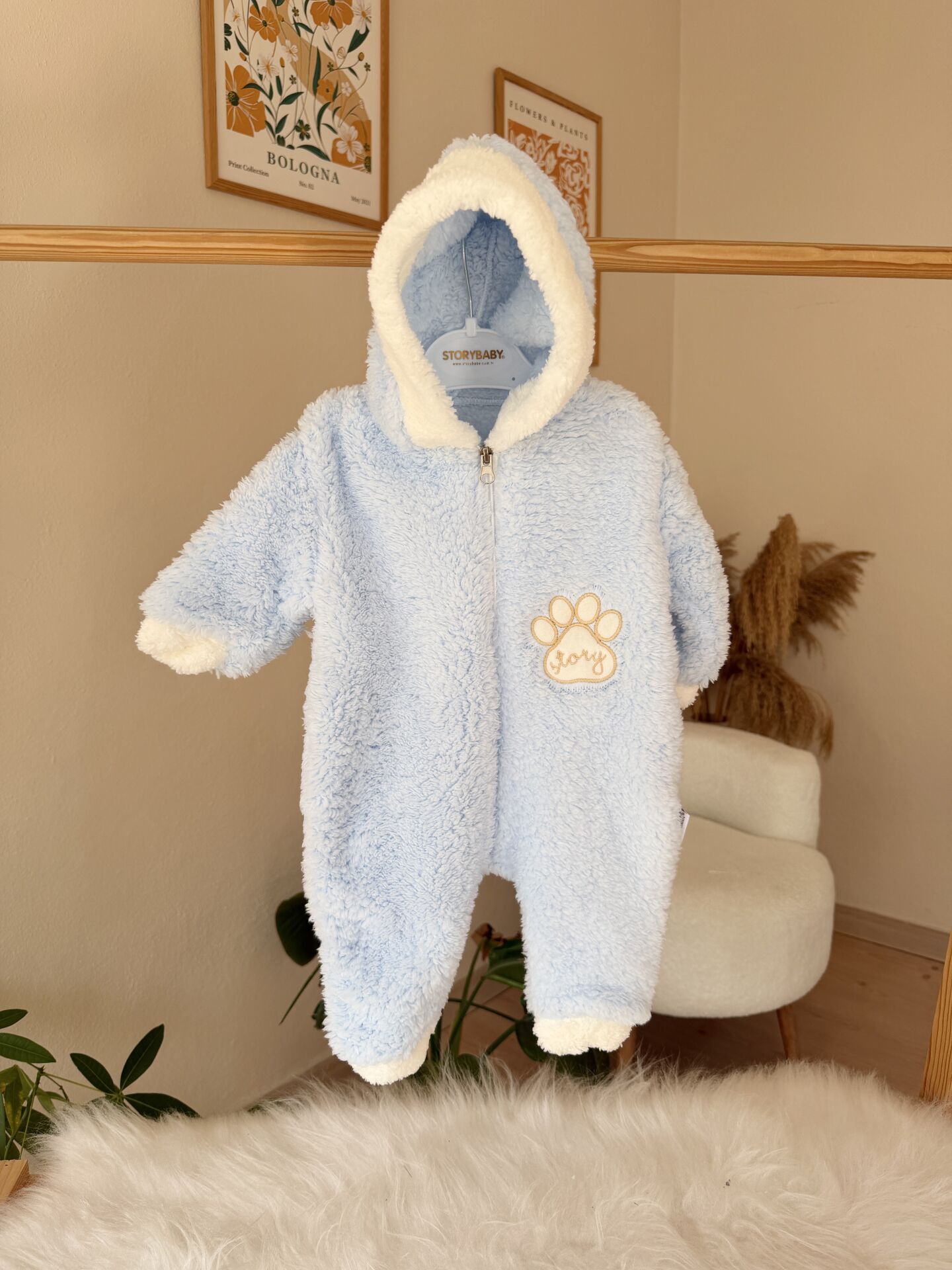 Mavi kapüşonlu peluş tulum